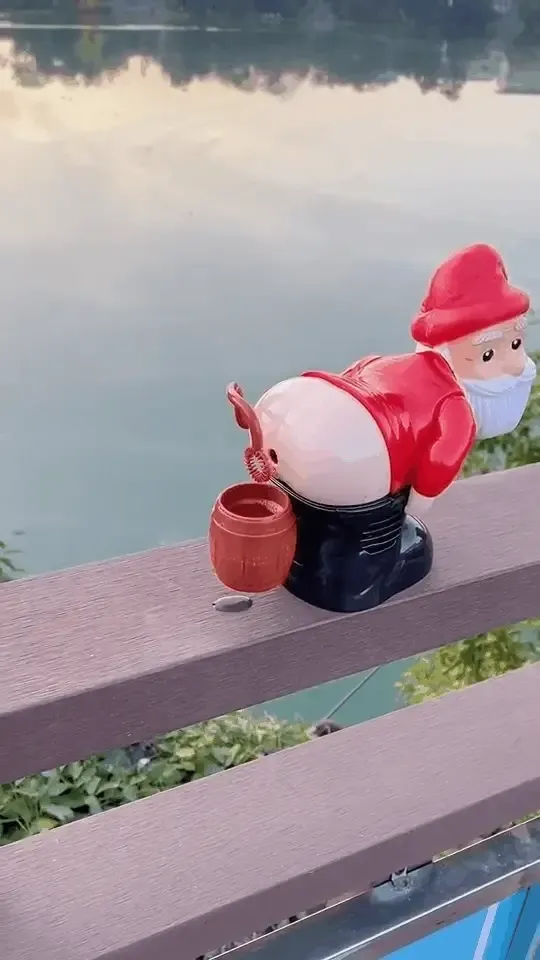 Funny Santa bubble machine blowing bubbles