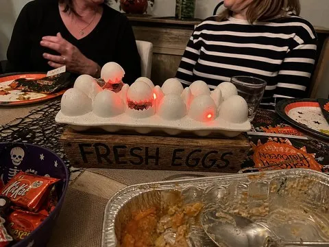 Zombie chick egg decoration at a casual Halloween potluck