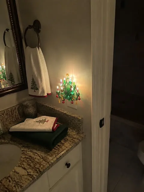 Christmas tree night light in a guest bathroom