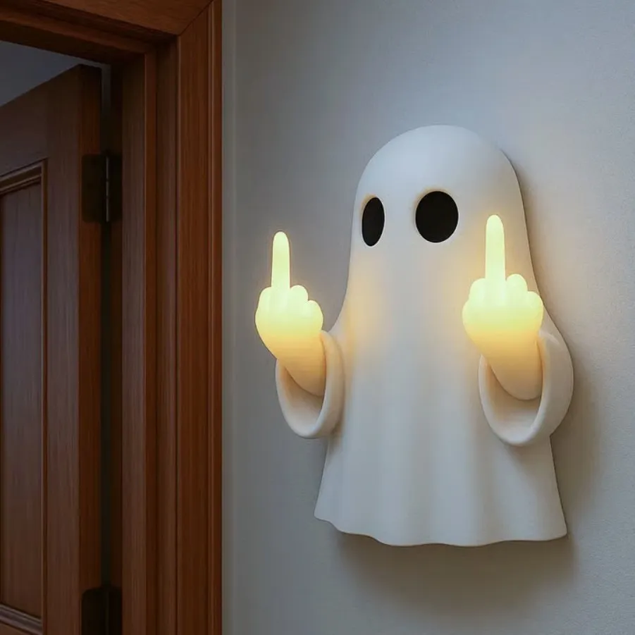 Cheeky double middle-finger ghost night light mounted near an entryway