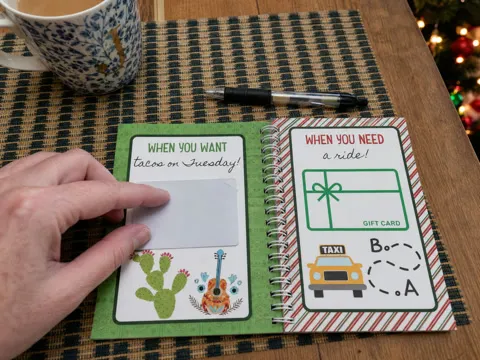 Filling gift card book pages at home