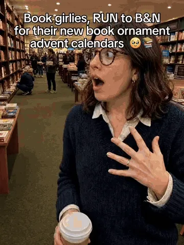 Opening the mini book advent calendar and hanging a tiny book ornament