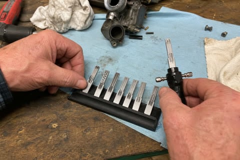 Customer-style workshop photo of the kit organized on a garage bench