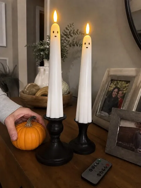 Speechless ghost candles on a family sideboard