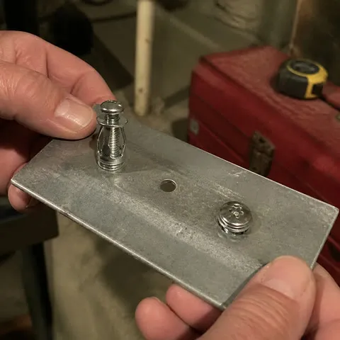 Checking jack nut fit on a galvanized test panel