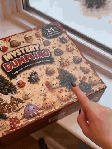 Animated demonstration of opening and squeezing mystery dumpling toys