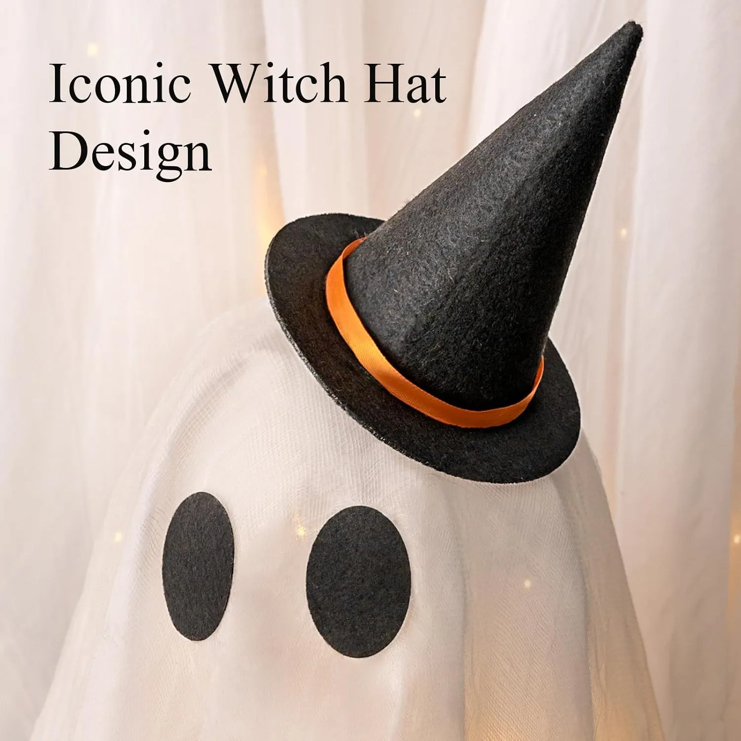 Close detail of the short ghost with its black witch hat and orange band