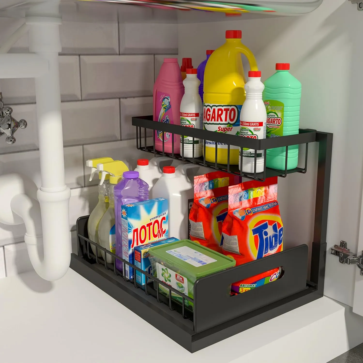 Black organizer loaded with cleaning supplies beneath a sink