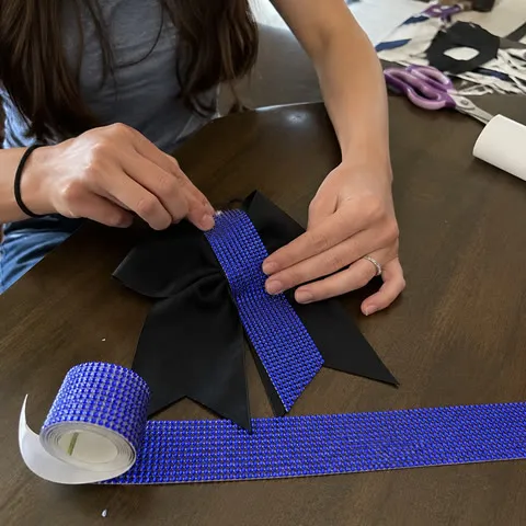 Royal blue rhinestone tape on a hair bow