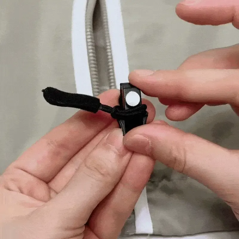 Universal zipper repair tool fixing a broken zipper