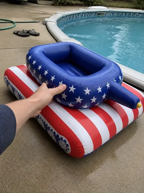 Inflatable tank at the edge of an above-ground pool