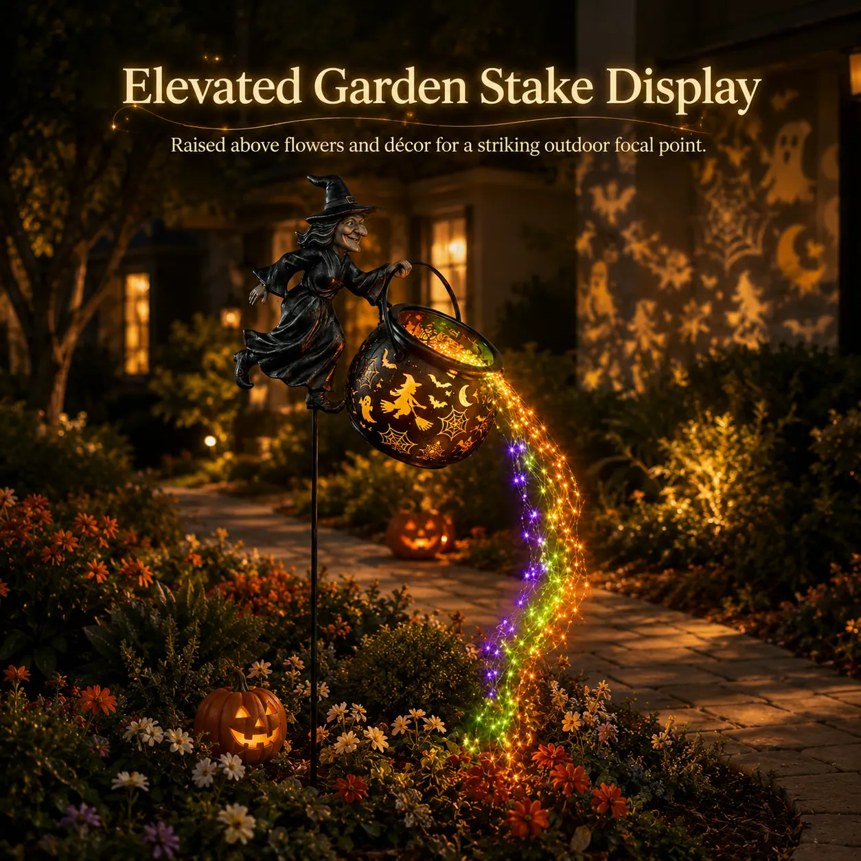Elevated witch cauldron garden stake display beside a walkway