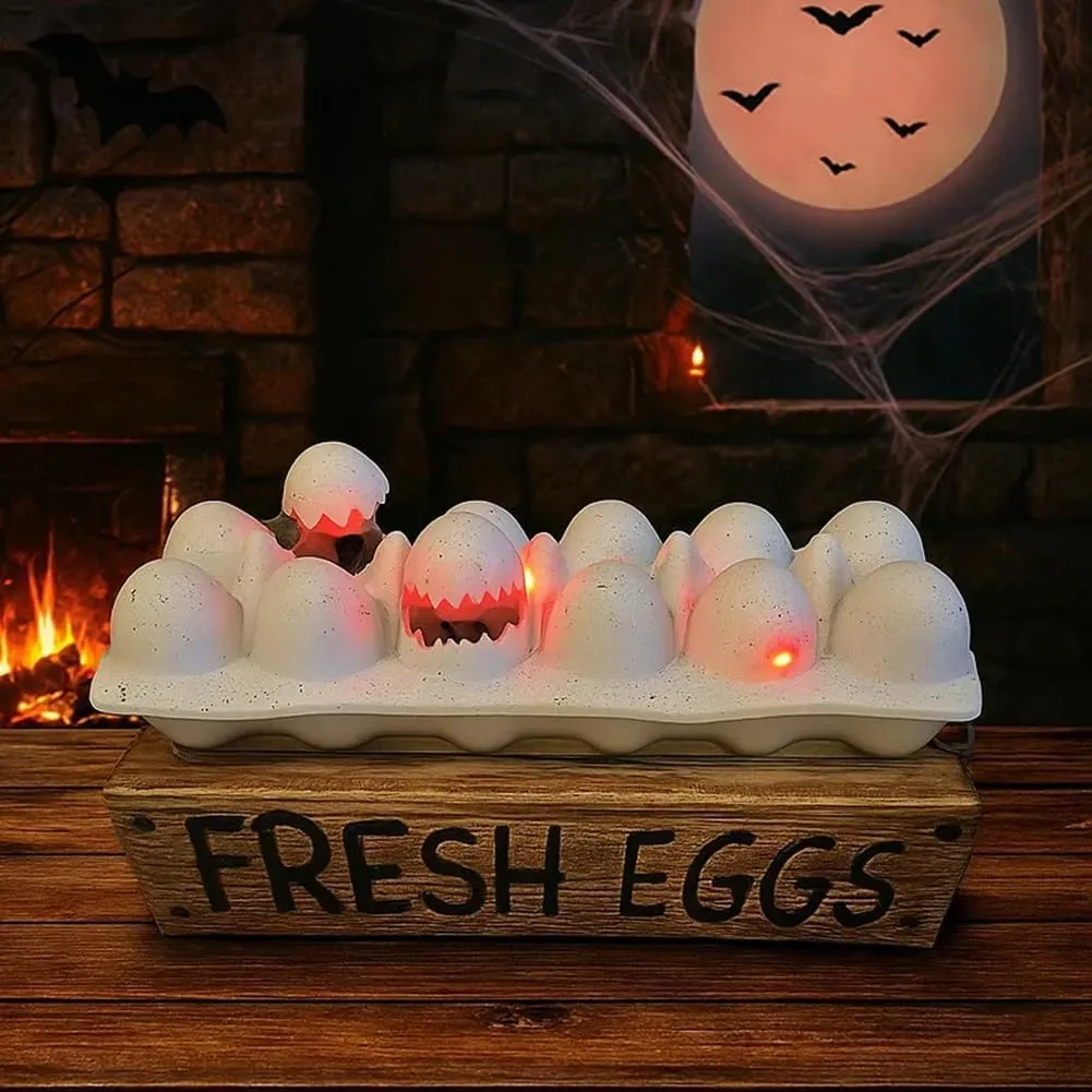 Glowing zombie egg tray styled by a fireplace for Halloween