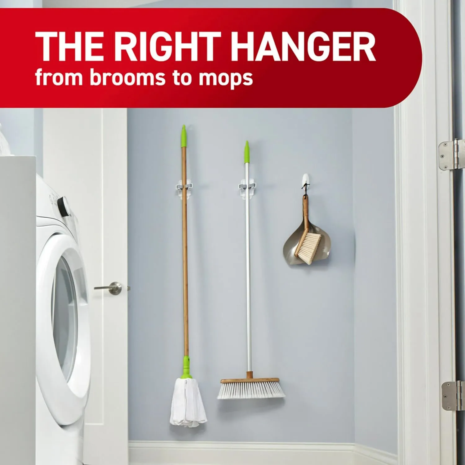 Brooms and mops stored neatly on a laundry-room wall