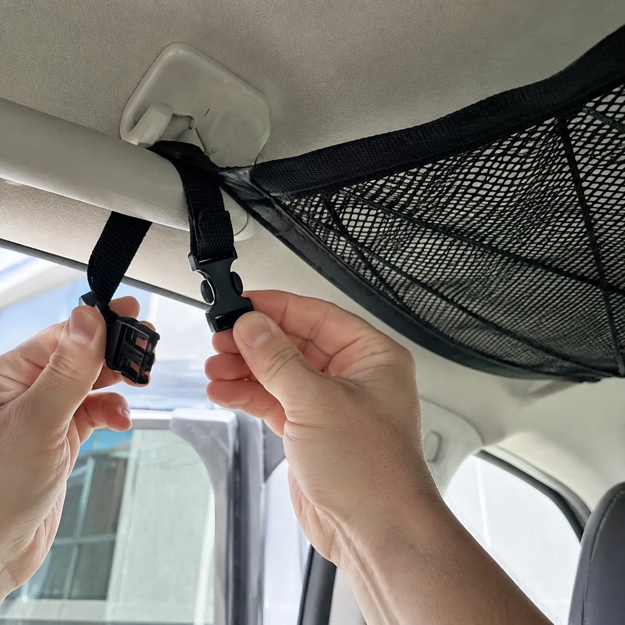 Customer installing an adjustable roof strap