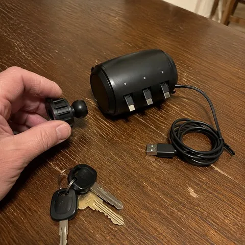 Charger and mounting parts on a wooden table