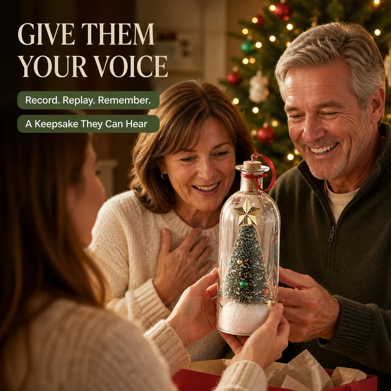 Family receiving a recordable Christmas tree keepsake
