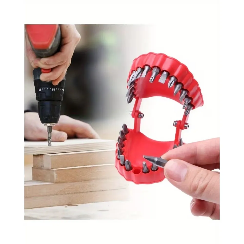A hand selecting a screwdriver bit from the red organizer