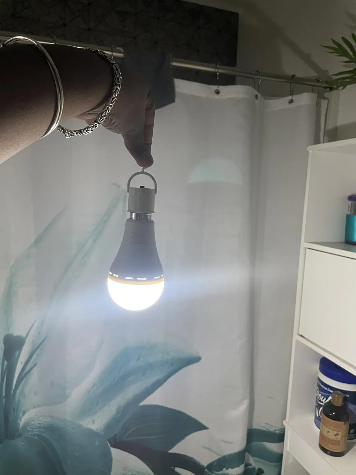 It works as a backup light, but only after you unscrew it and use the connector.