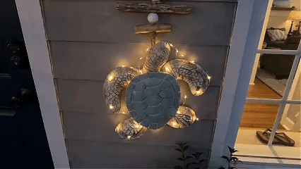 Lit sea turtle wall decor daytime and night display