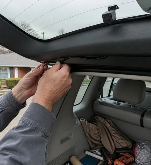 Customer routing the rear camera cable