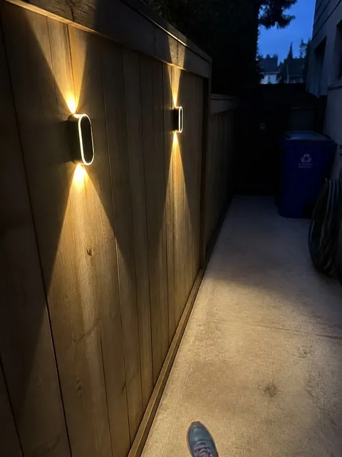 Outdoor solar wall lights in a customer's home setting