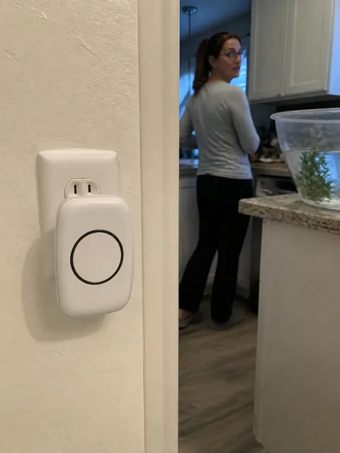 Plug-in chime receiver near a home kitchen