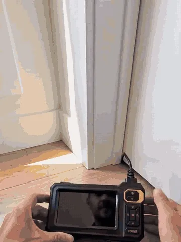 Inspection camera checking hard-to-see spaces