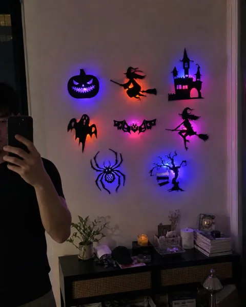 Glowing Halloween silhouettes in an apartment living room