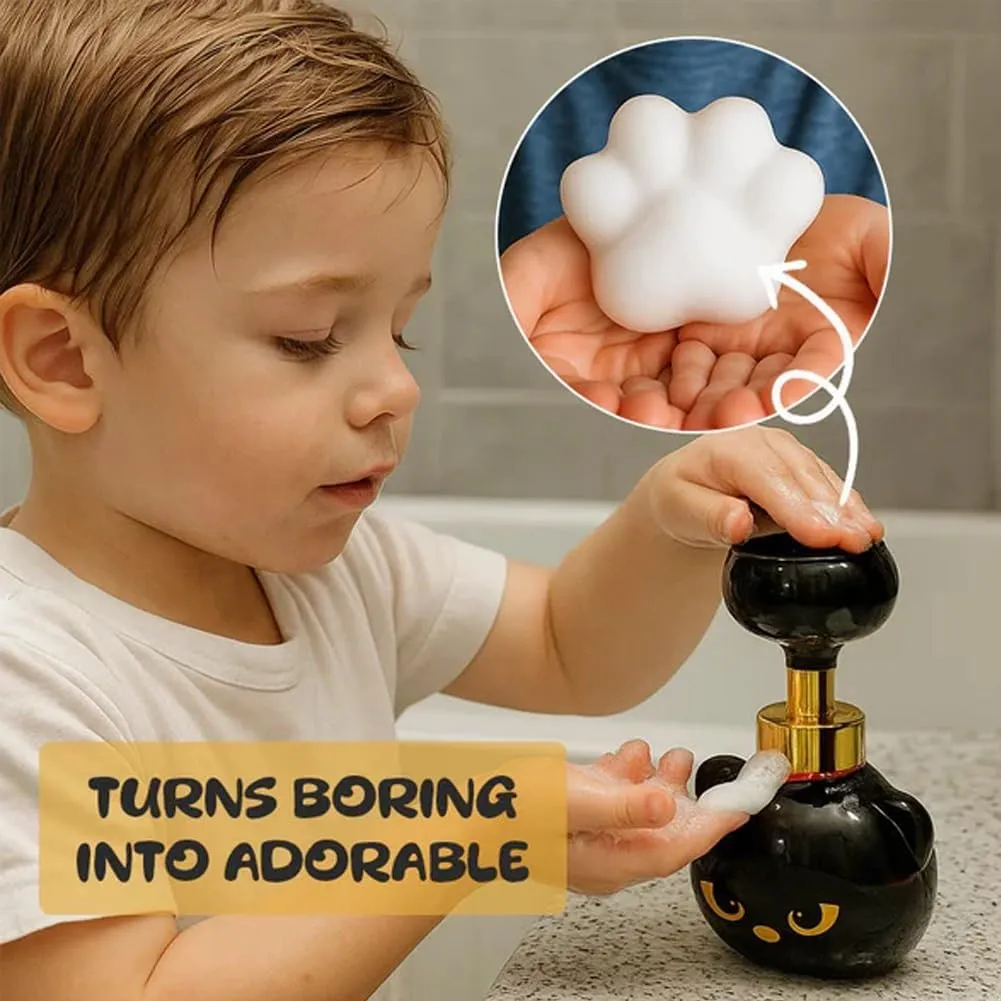Child pressing the cat paw foam soap dispenser