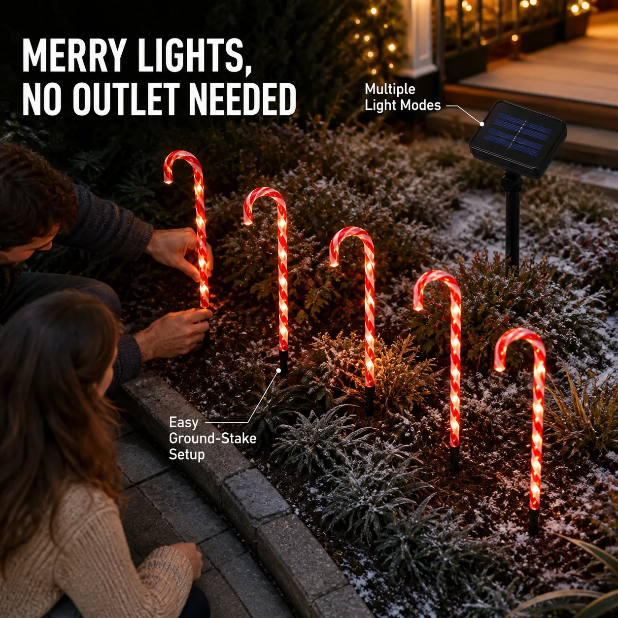 Family installing five solar candy cane pathway lights
