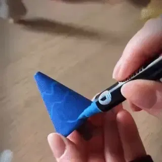 Painting a wooden tree with acrylic markers