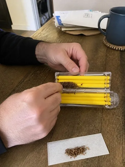 Manual roller being loaded on a home kitchen table