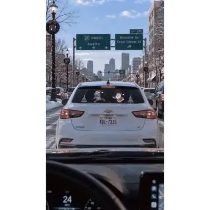 DrivePixel rear window display on a winter city street