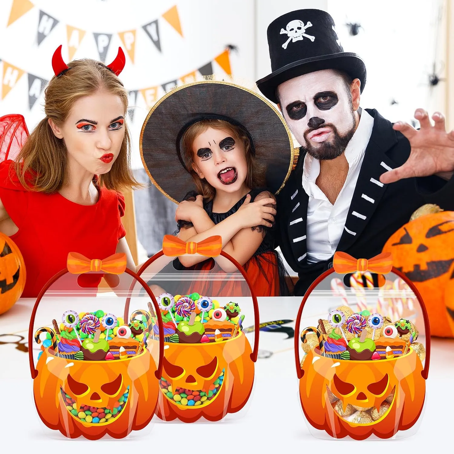 Family Halloween party with matching orange pumpkin treat bags