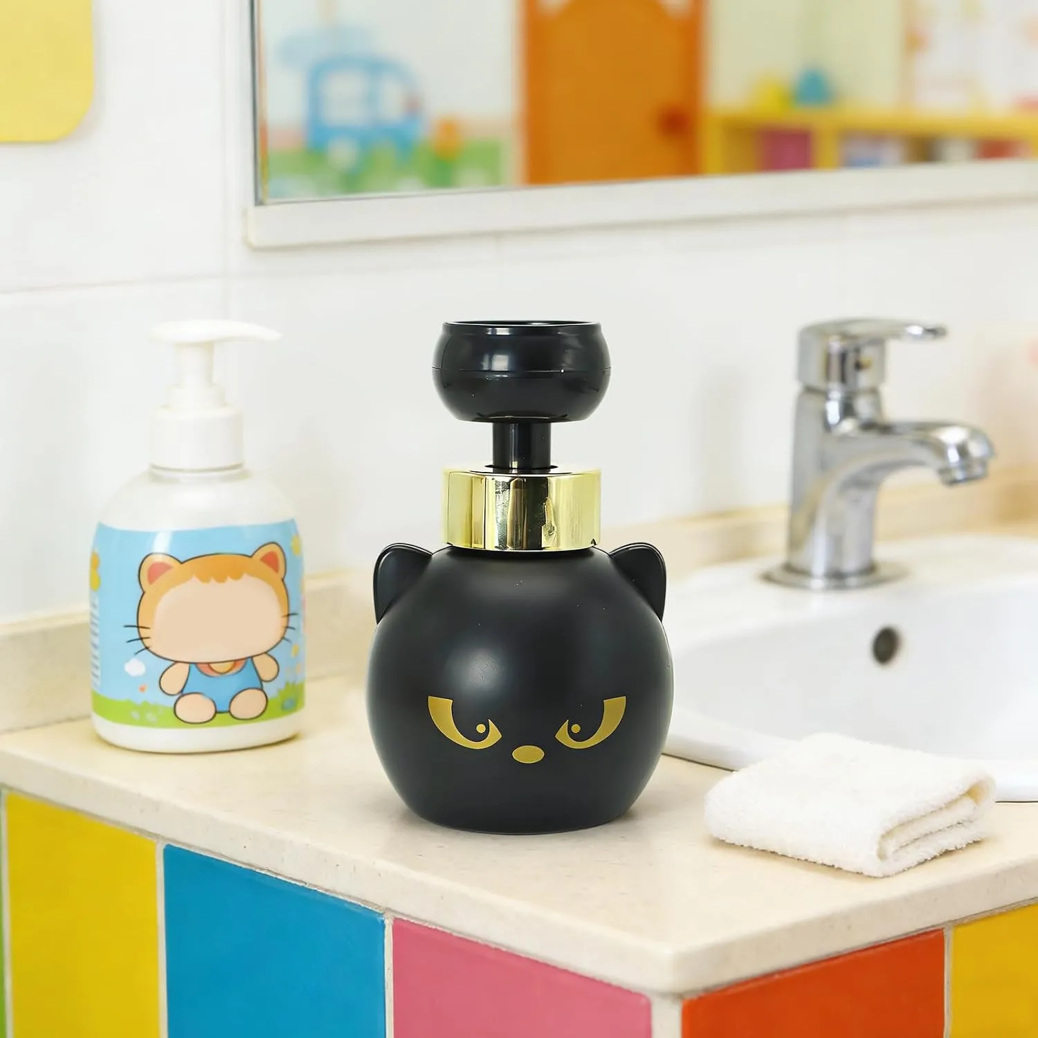 Black cat dispenser displayed beside a bathroom sink