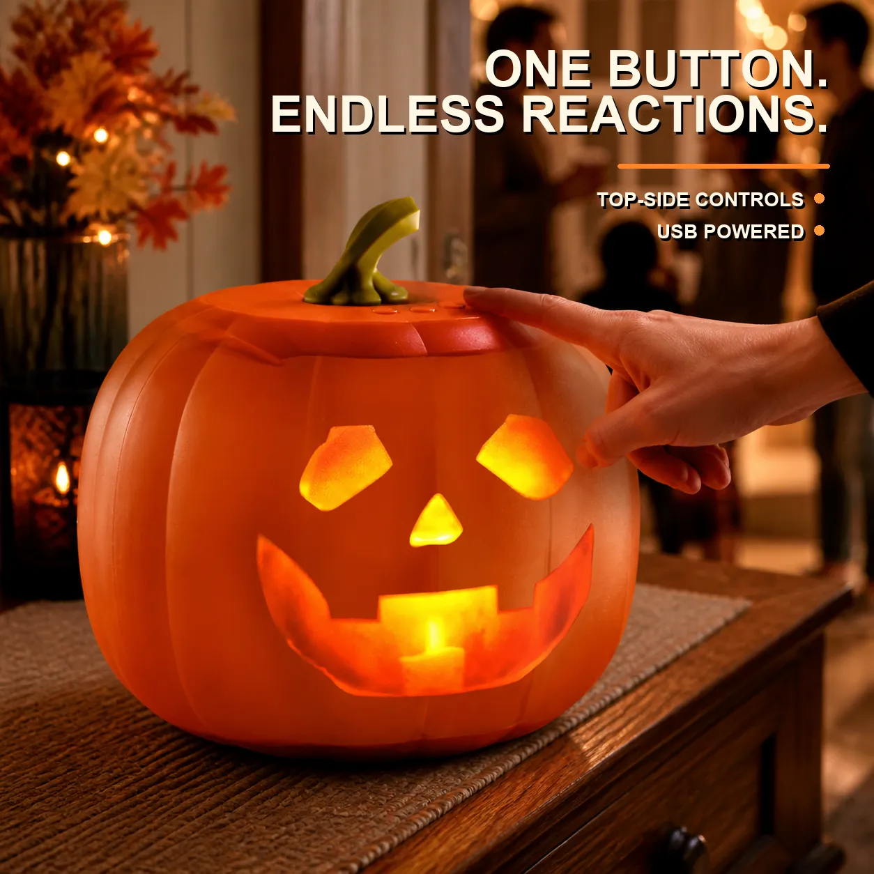 Hand using the top controls on the animated pumpkin