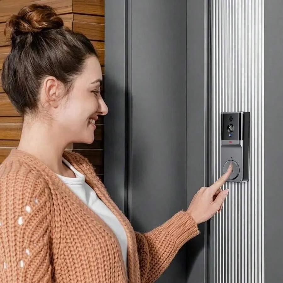 Homeowner using the video doorbell at a front entry