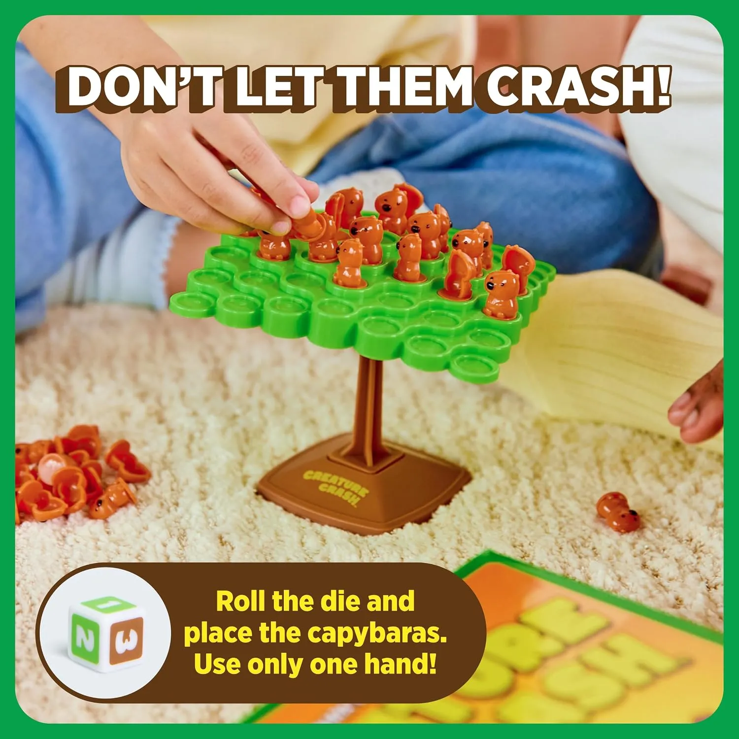 A player places an orange capybara piece on the green balancing board