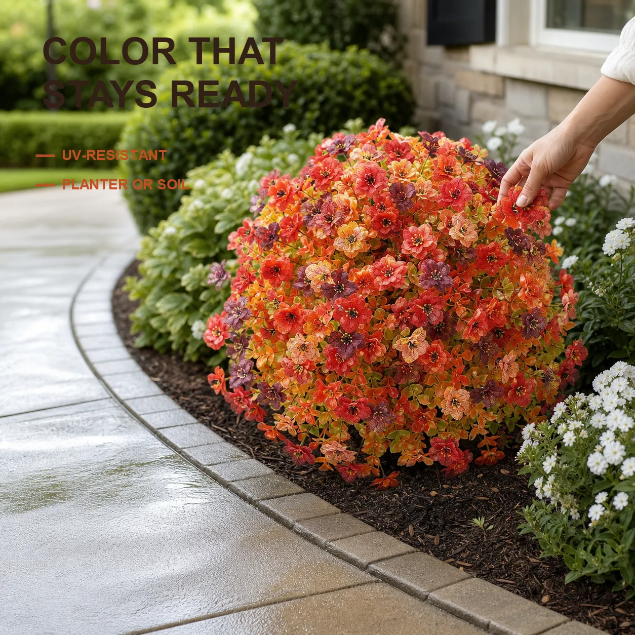 Artificial flower topiary in a landscaped garden border with benefit text