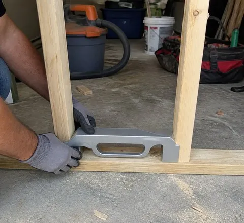 Garage framing project using a stud spacing jig