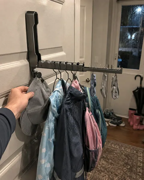 Gray rack organizing jackets in a mudroom