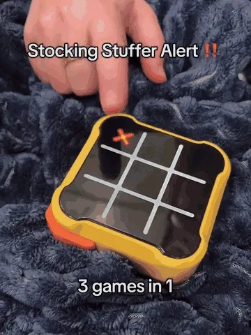 Family enjoying the electronic tic-tac-toe game at home