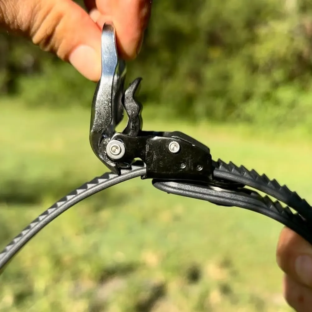 Close view of the metal buckle and toothed strap grip