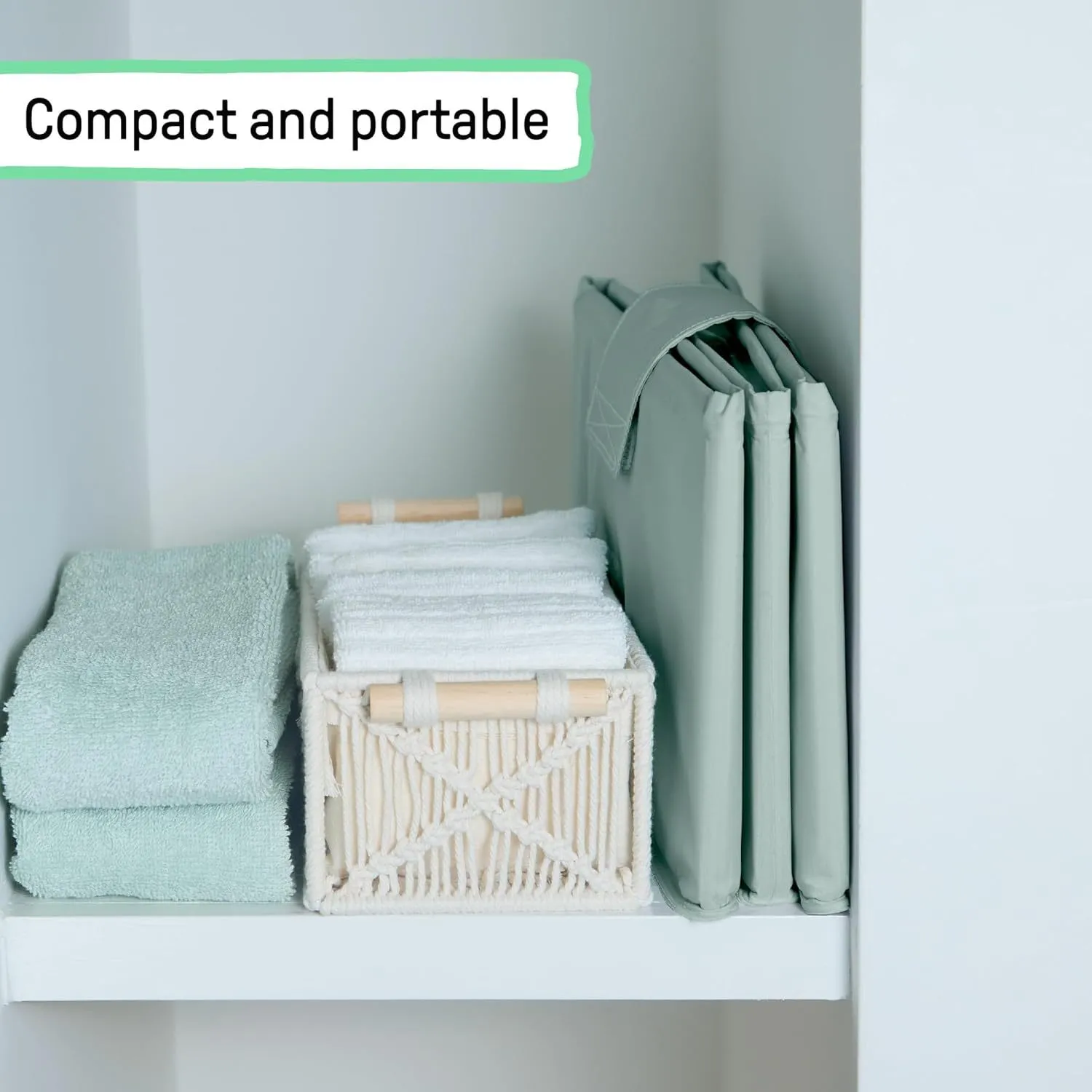 Mint basin folded flat beside bath towels