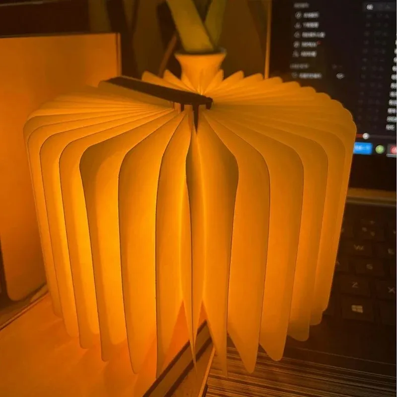 Book light opened into a full circular decorative form