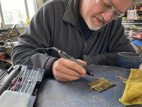Home workshop project polishing a brass hinge