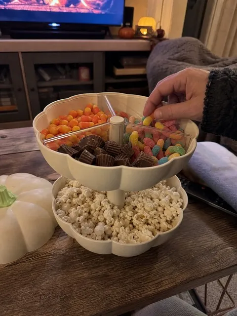 Cream pumpkin snack server on a family movie-night table