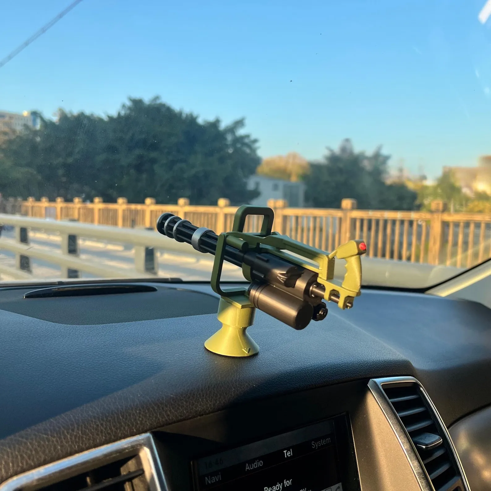 Rotating ornament displayed on a vehicle dashboard