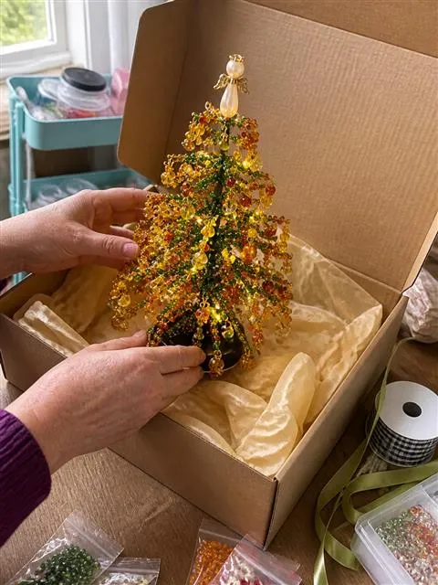 Autumn beaded tree being packed as a handmade gift